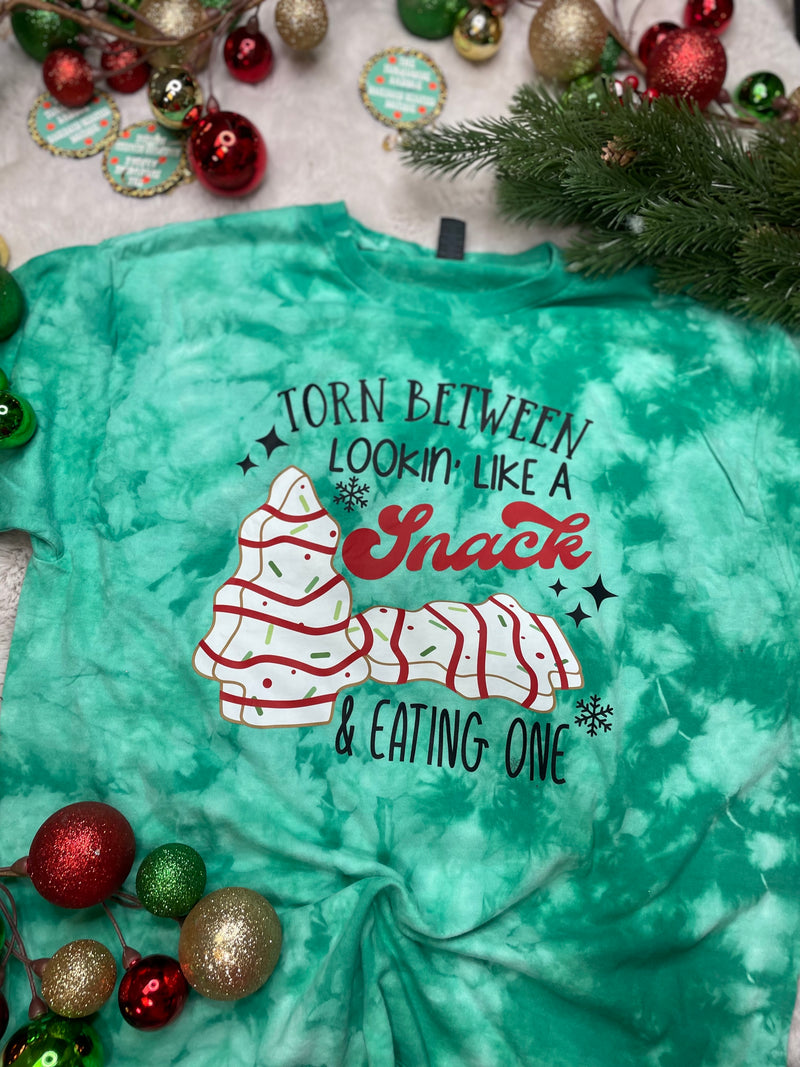 Torn Between Christmas Tree Cakes Tee